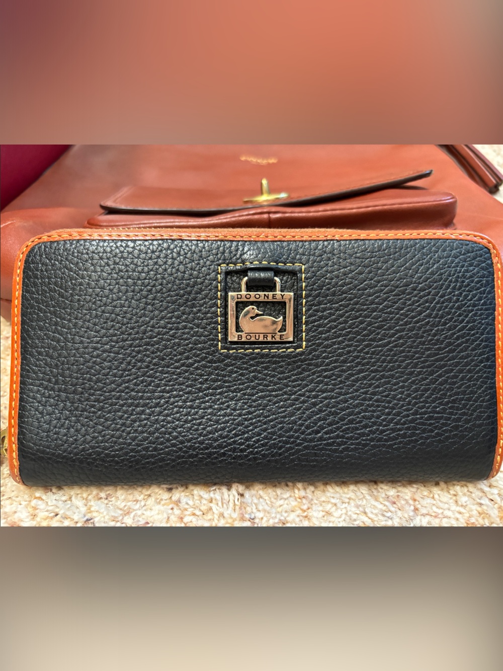 Dooney & Bourke Black with Tan Trim Pebbled Leather Men's Zip Wallet